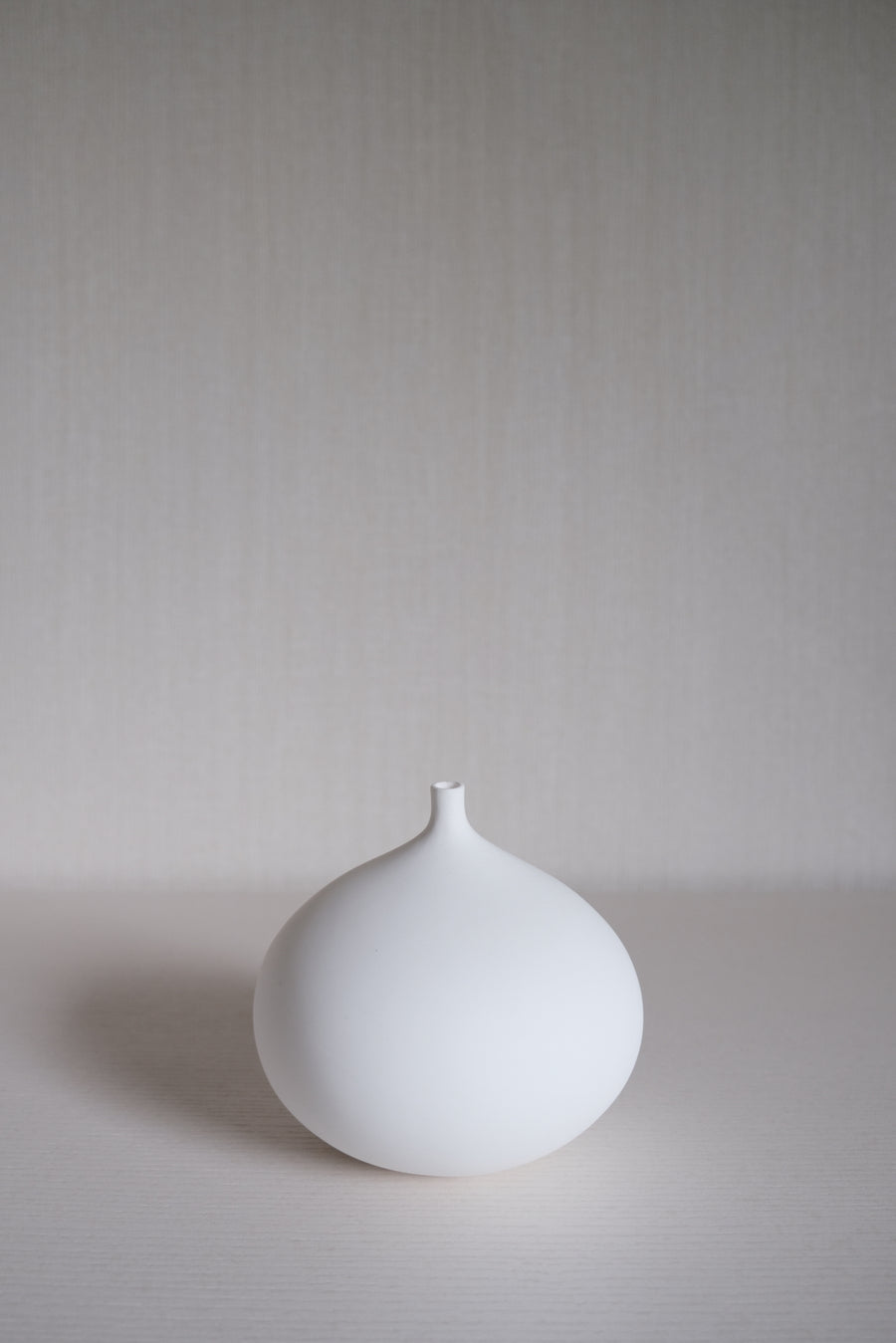 Flat Round Vase